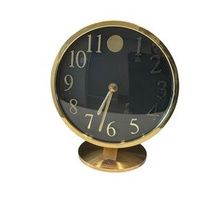 Vintage Howard miller W. Germany brass museum quartz clock